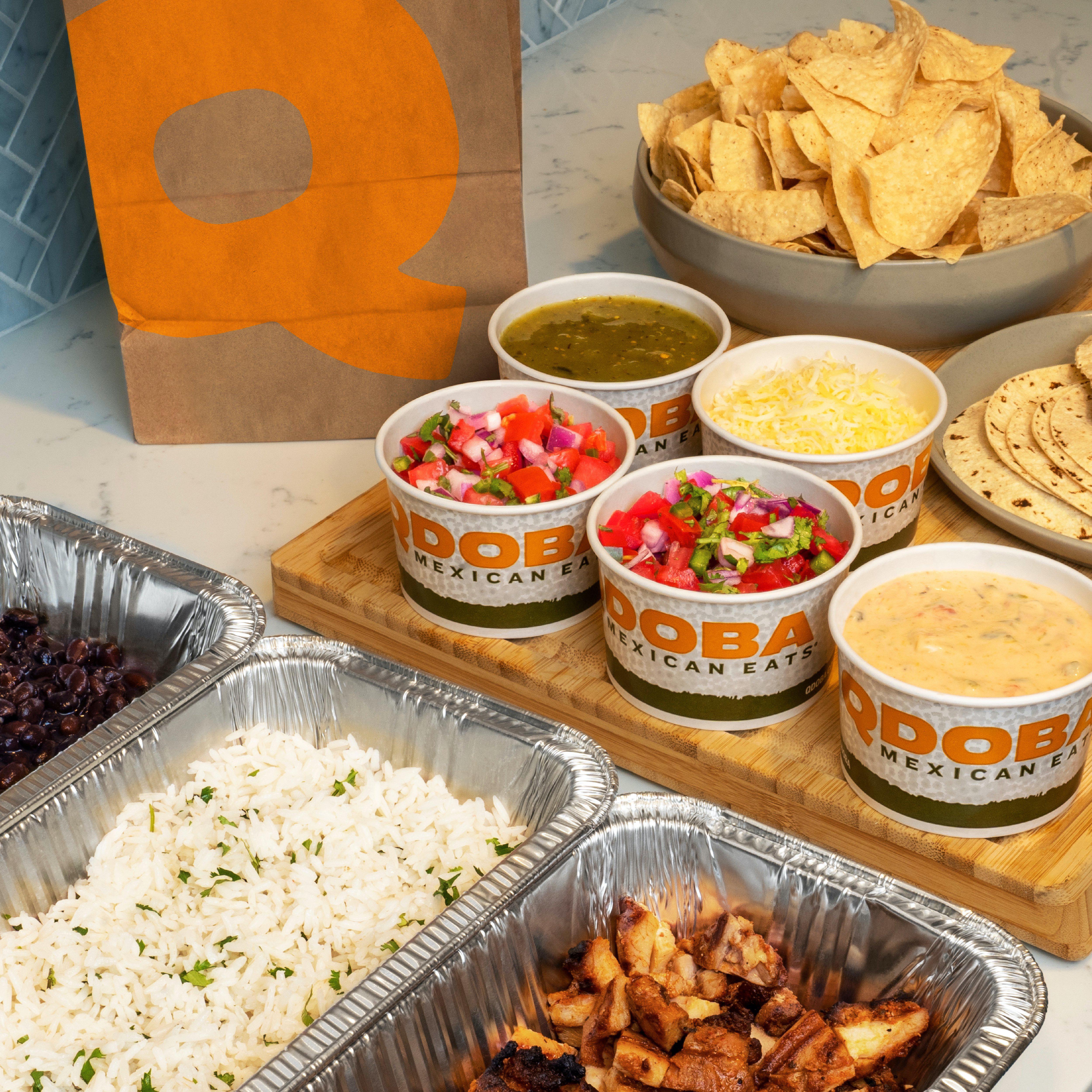 Family Meals come with all of the fixings to make flavorful tacos or bowls for 4-5 people. QDOBA Mexican Eats Orlando (407)506-7379