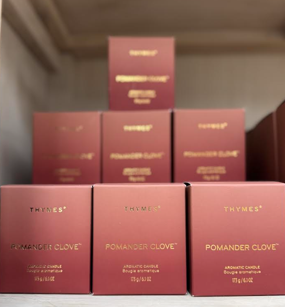 Discover Thymes Pomander Clove aromatic candles at Ritters Garden & Gift. Packaged in elegant coral  