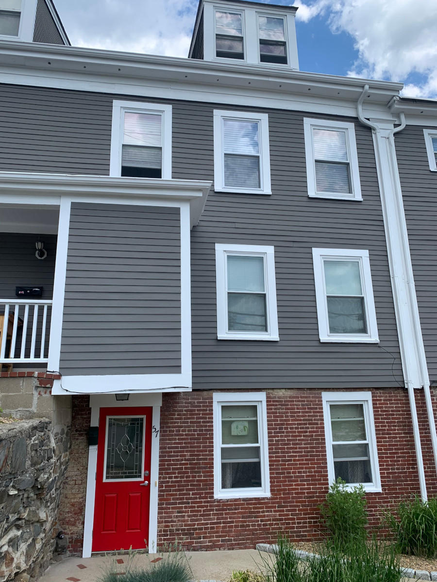 For this residence in Haverhill, MA, we provided a new paint job on a mature building for a fresh look!