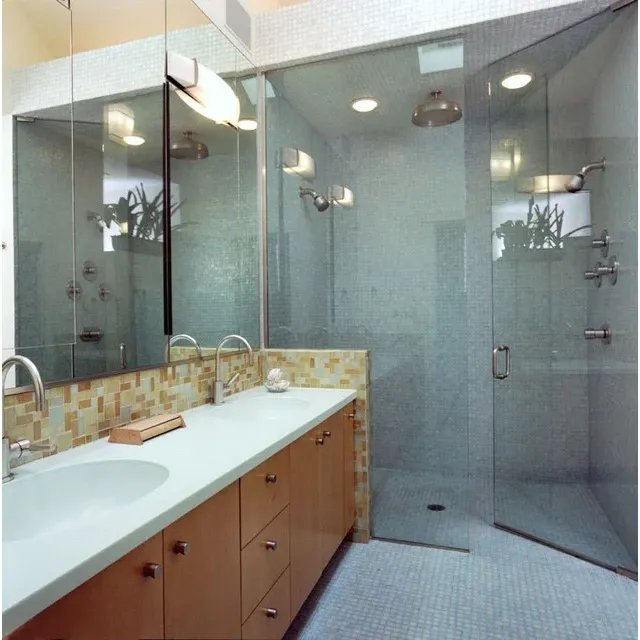 Custom bathroom remodel with glass walk-in shower, double vanity, and modern fixtures completed by Elevate Remodels in Montgomery County, MD.