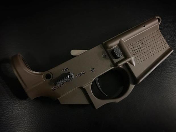 Images Armory Valentine, LLC Cerakote Coating, Laser Engraving & Custom Holsters
