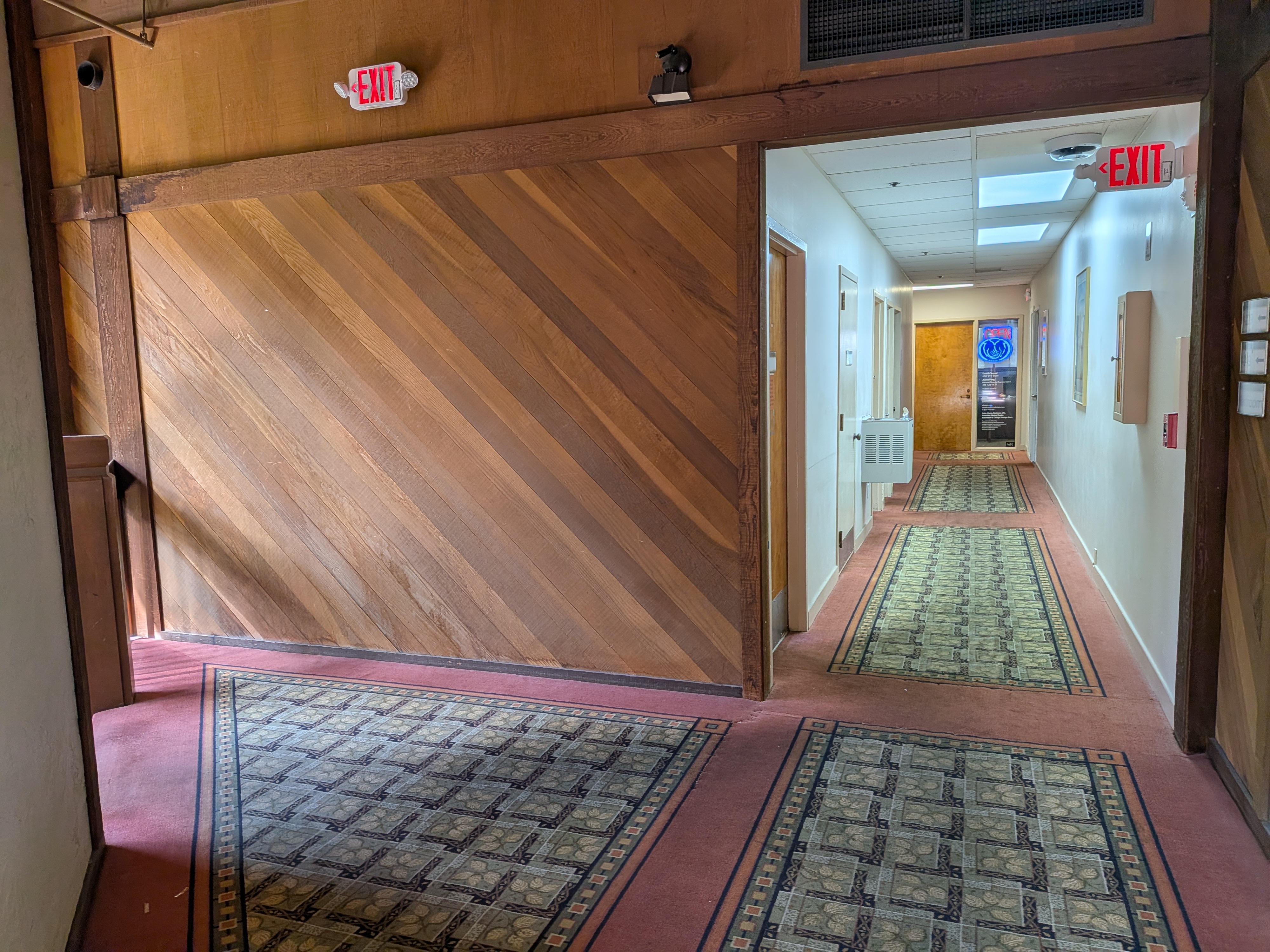 Turn Left at top of stairs or exiting elevator