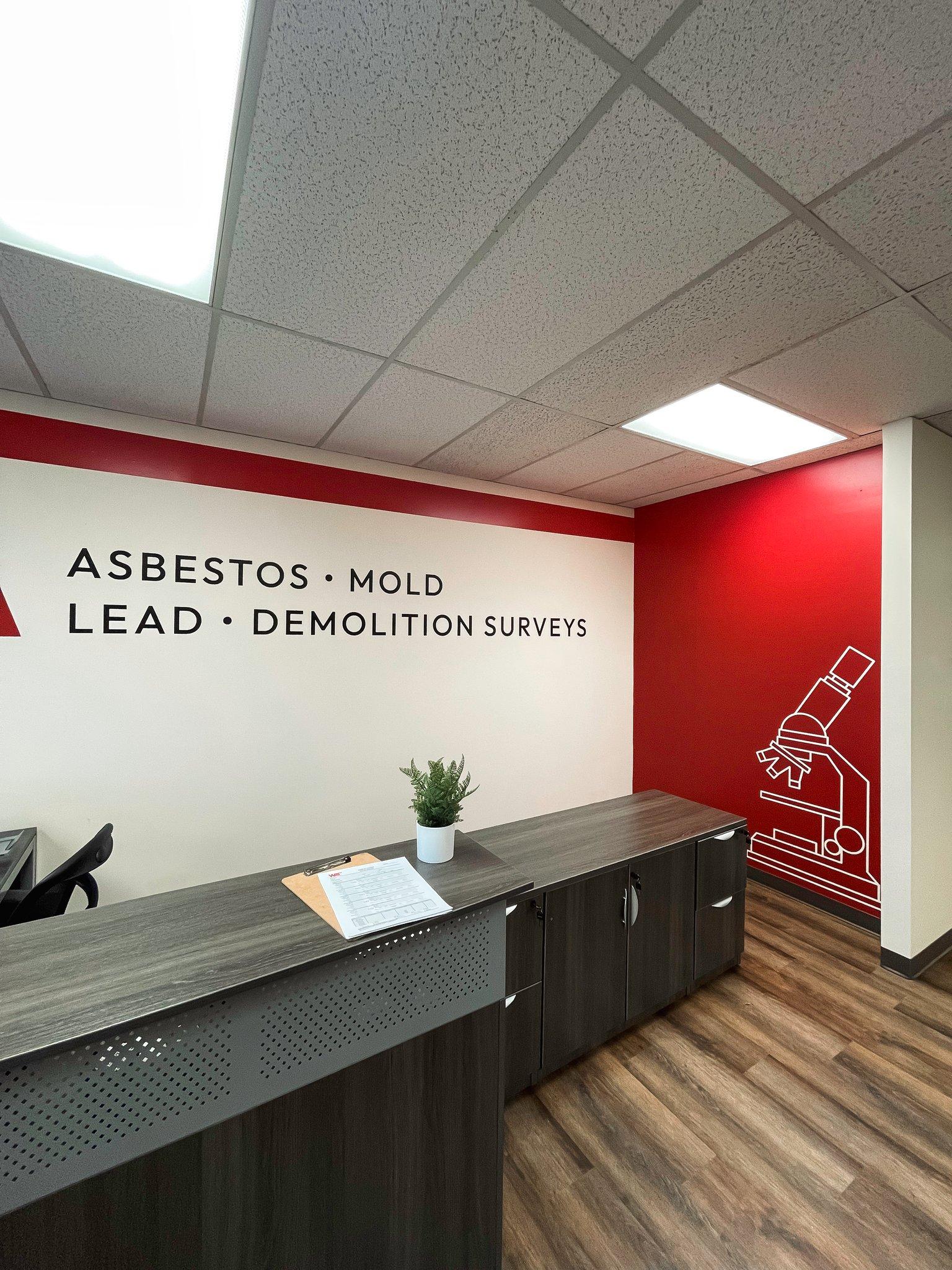 Reception wall graphics and accent wall art for an environmental testing office, installed on-site by Ardor Printing.