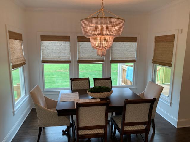 The natural look is very popular, and we can see why! These Bamboo Shades added the perfect finishing touch to Dallas, GA dining room. #BudgetBlindsKennesawAcworthDallas #BambooShades #NaturalShades #DallasGA #FreeConsultation