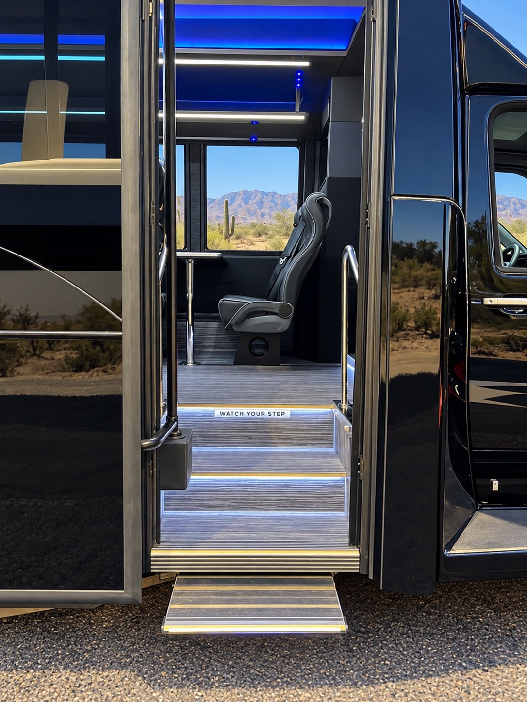 Extended shuttle entrance with illuminated steps and handrails.