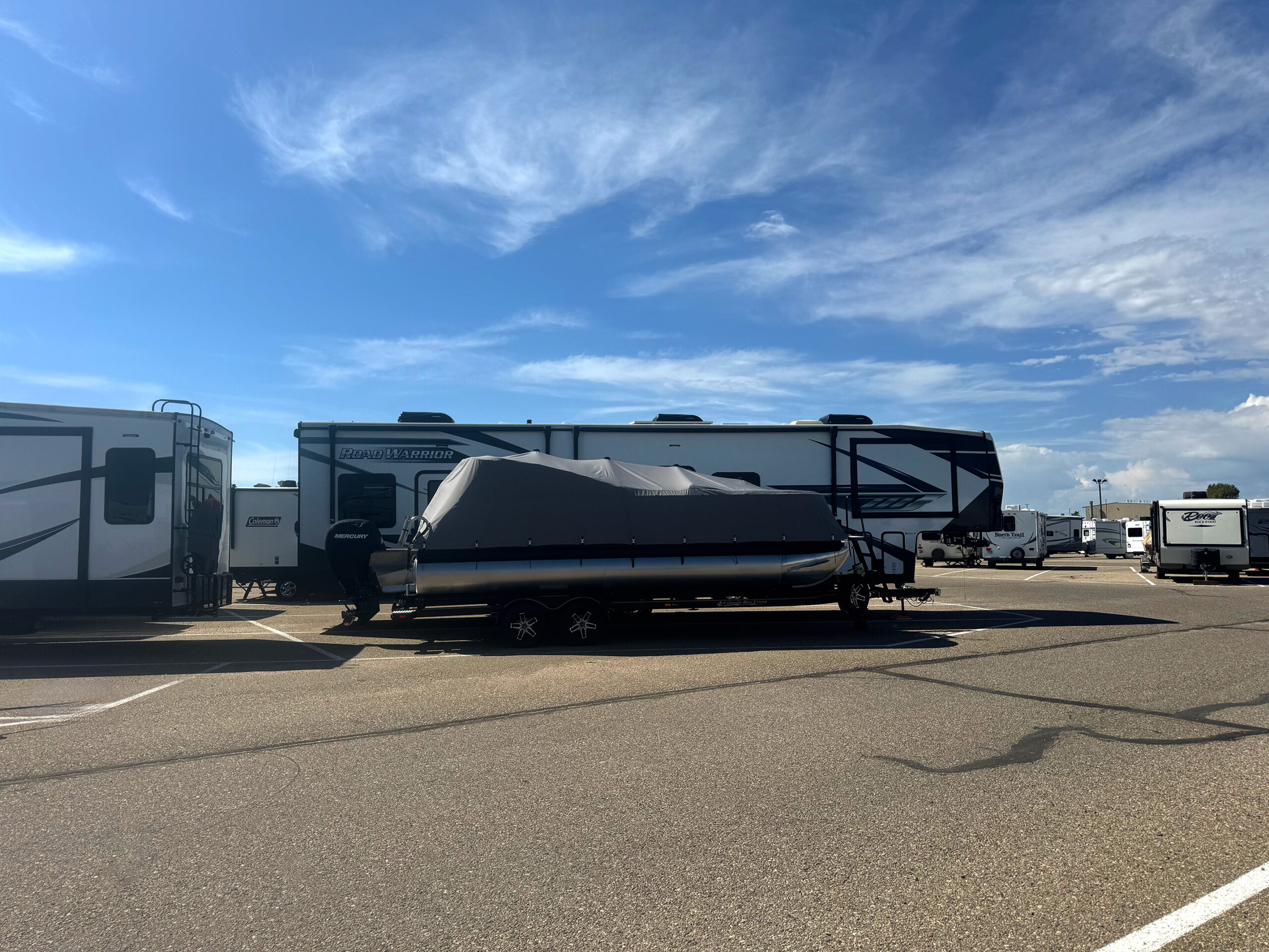 Month-to-month boat storage behind Trailer Source in Mead, CO