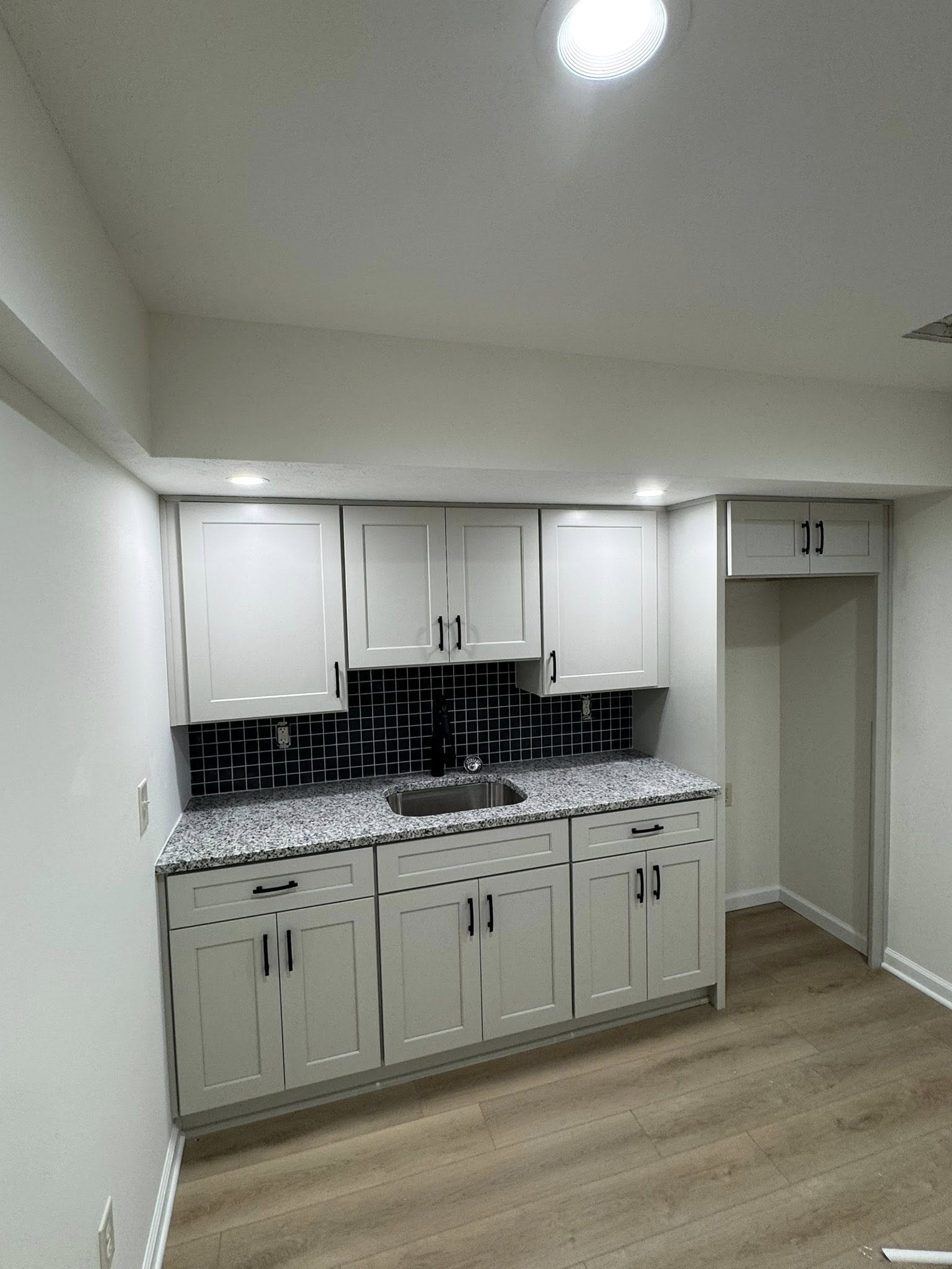 Custom basement bar installation completed for a residential remodeling project in Greenwood, Indiana
