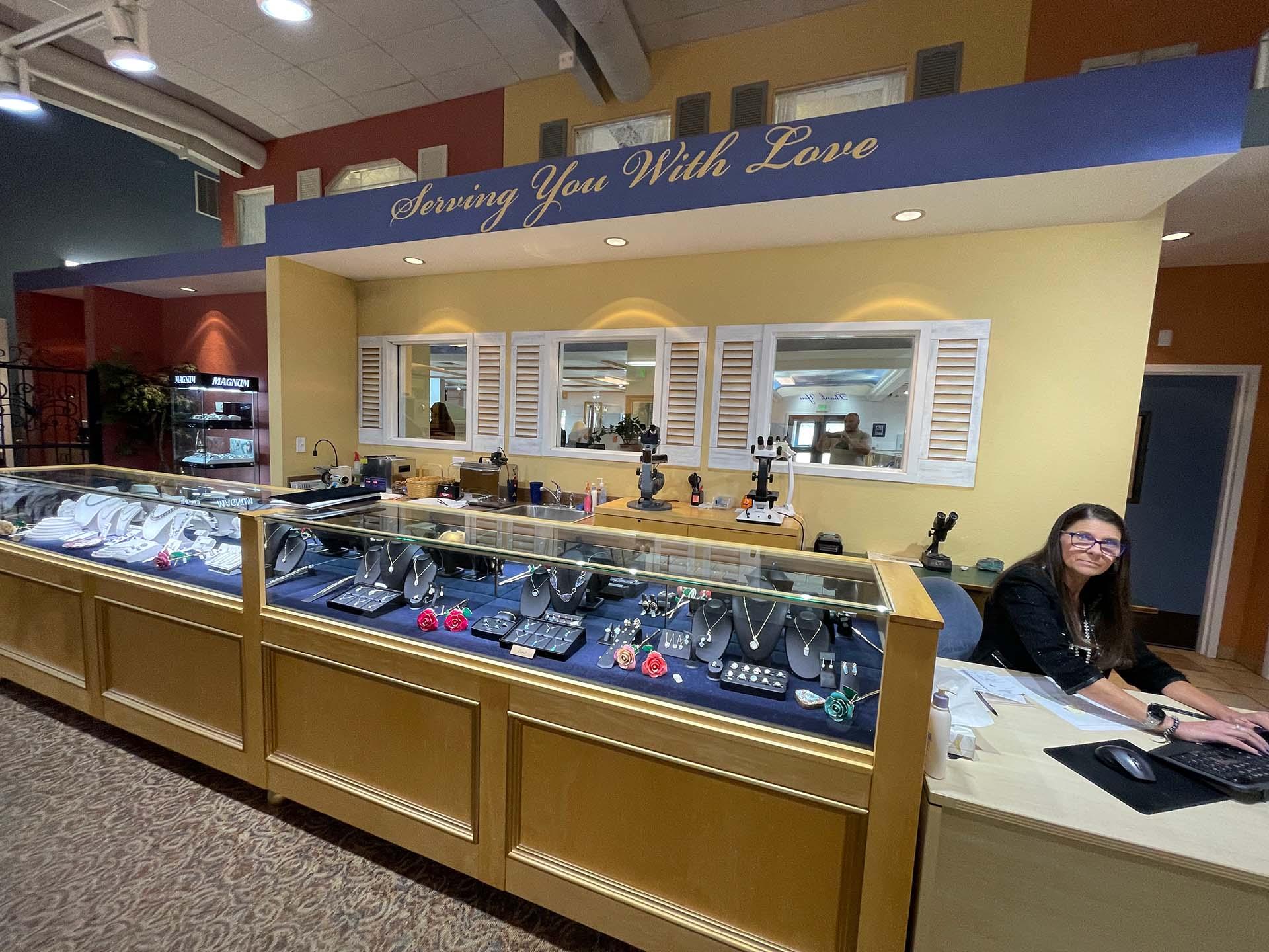 Luisa Graff Jewelers precious gem jewelry cases and back counter