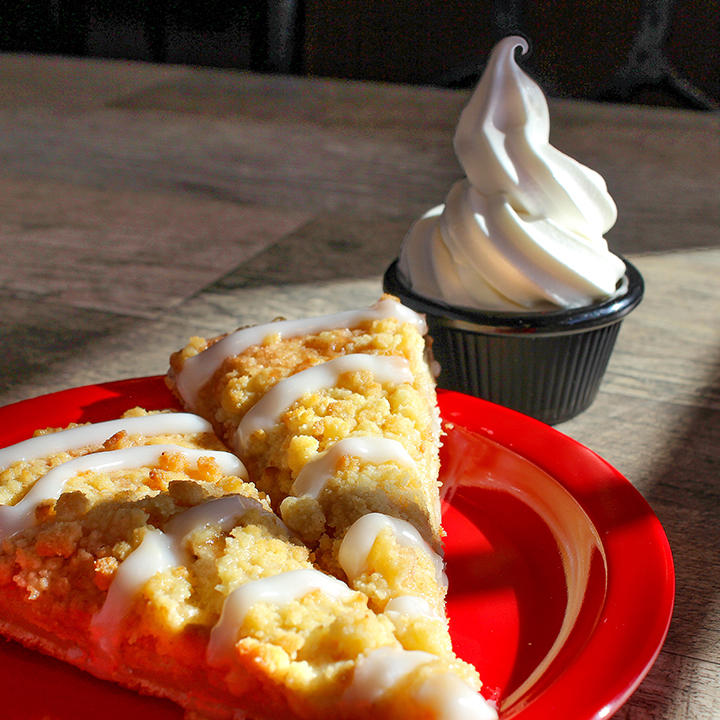 You can't go wrong with a slice (or two) of our famous Cactus BreadÂ®! Add a cup of our soft serve ice cream to complement each bite.