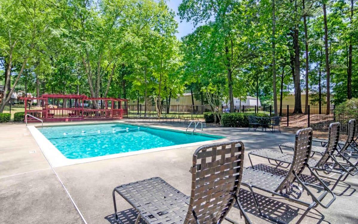 Beautiful swimming pool with ample seating around the sundeck.