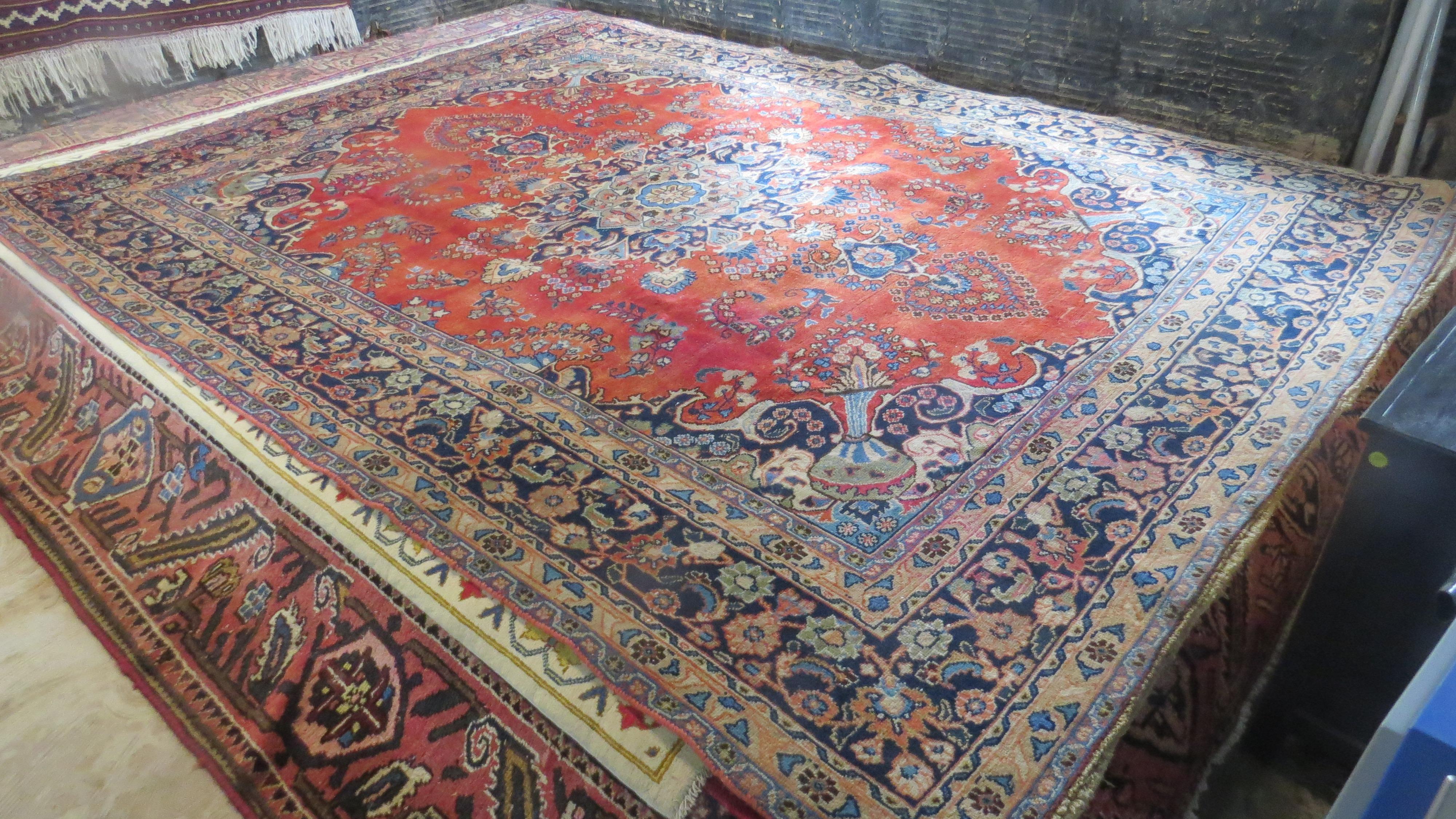 8x12ft Antique Persian Sarouck with Vases nestled in the corners.
Only available at Carpetbeggars Hand Knotted Rugs in Baltimore