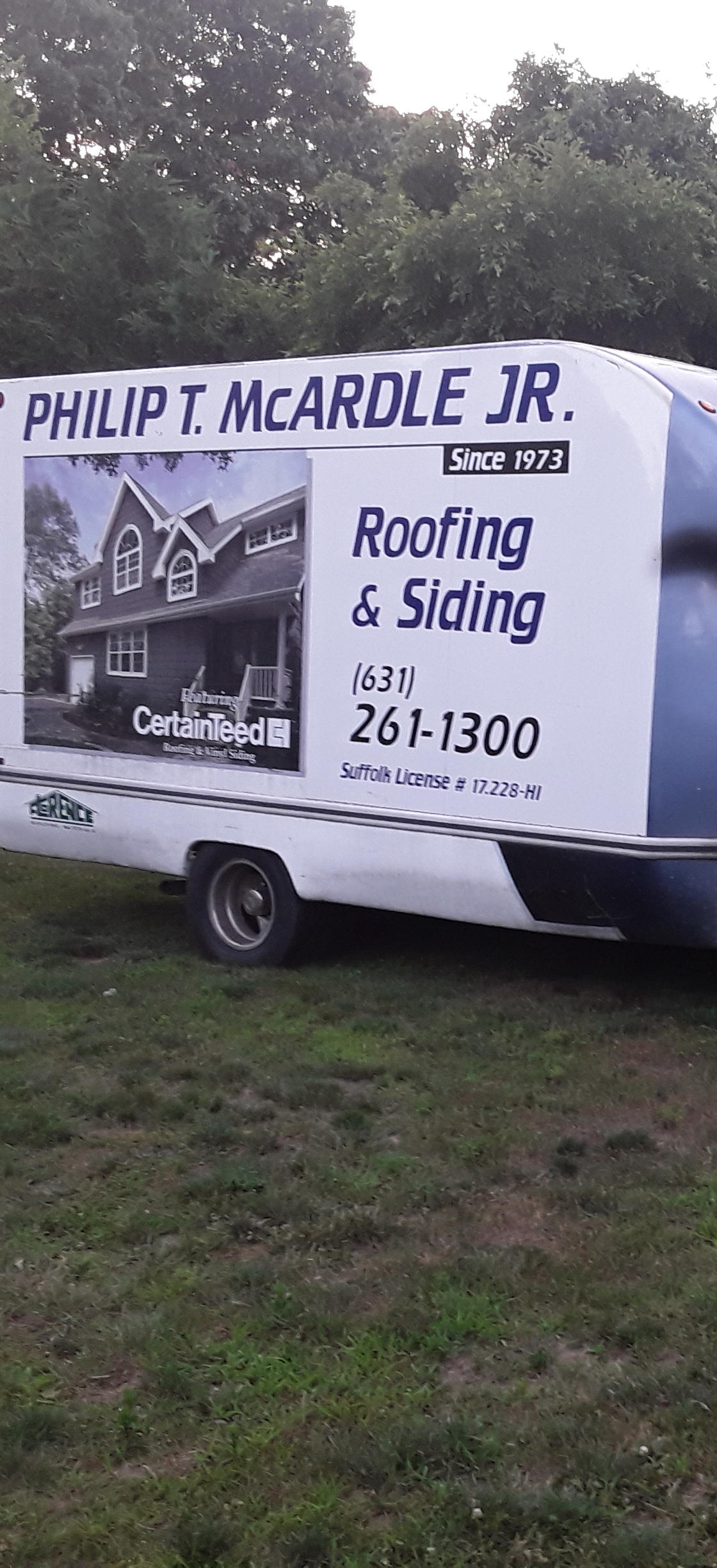 McArdle Roofing &amp; Siding Logo