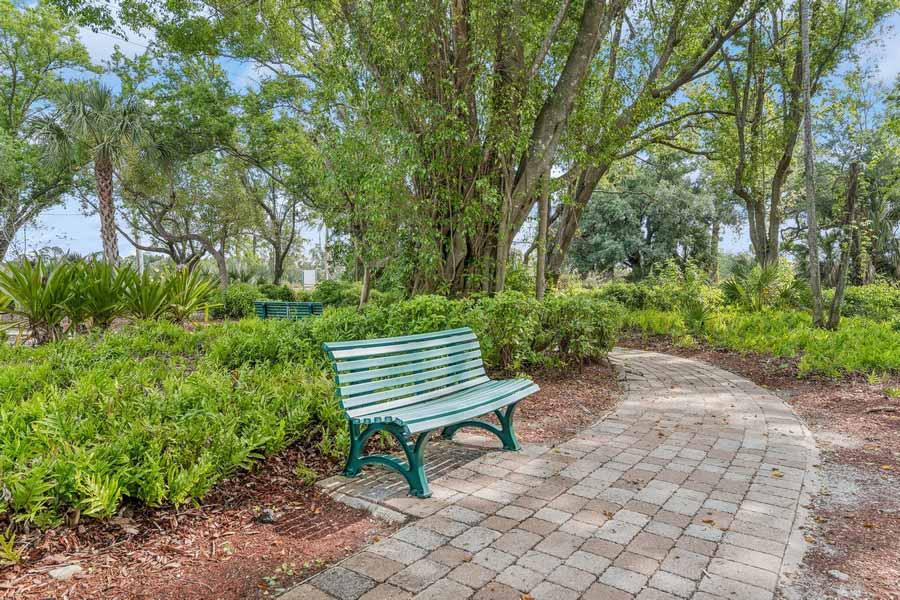 The Palms of Fort Myers walking paths with benches