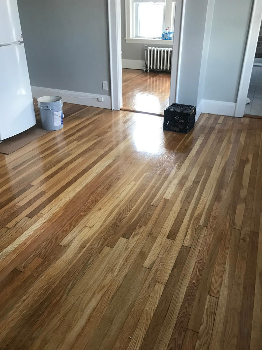 For this job in Peabody, MA, we sanded, repaired and refinished 80 year old floors-what a glorious shine!