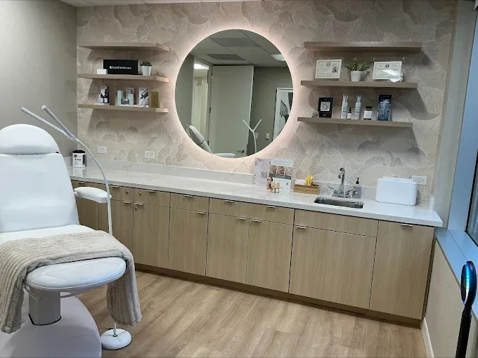 Private consultation room for Women’s Wellness Institute of Dallas and cosmetic gynecology services, designed for comfortable, confidential patient care and personalized treatment discussions.