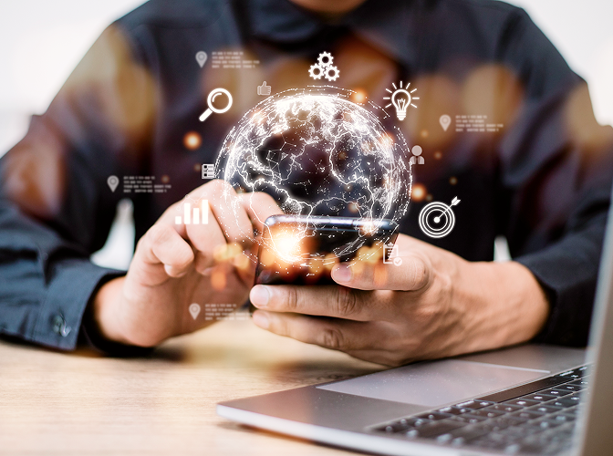 Close-up of a person scrolling on their phone with an illustration of a glowing globe over top.