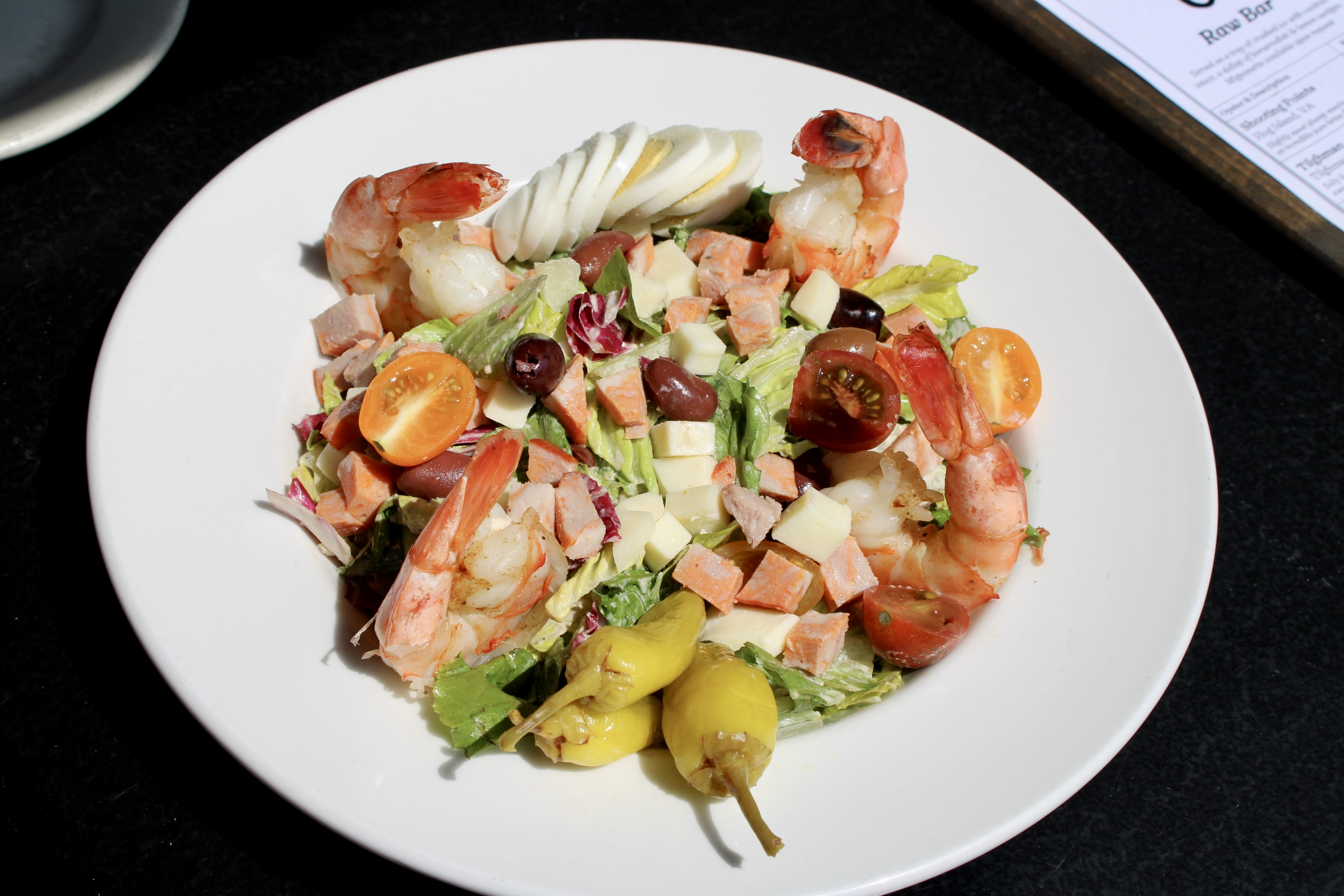 Mama's Classic Salad with jumbo shrimp, capicola ham, provoline, eggs, kalamata olives, etc. 