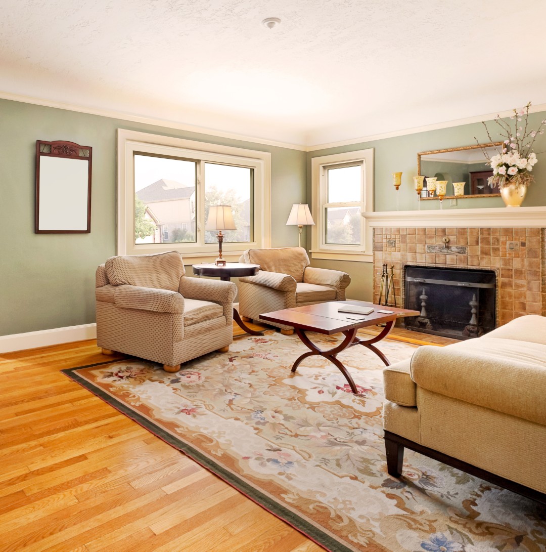 The EcoTek 1200 - 2200 Series Slider Window adds a wide, open view and easy-glide functionality to this living room. Its clean lines seamlessly complement the classic decor, enhancing the natural light while maintaining energy efficiency and providing a modern yet timeless look.