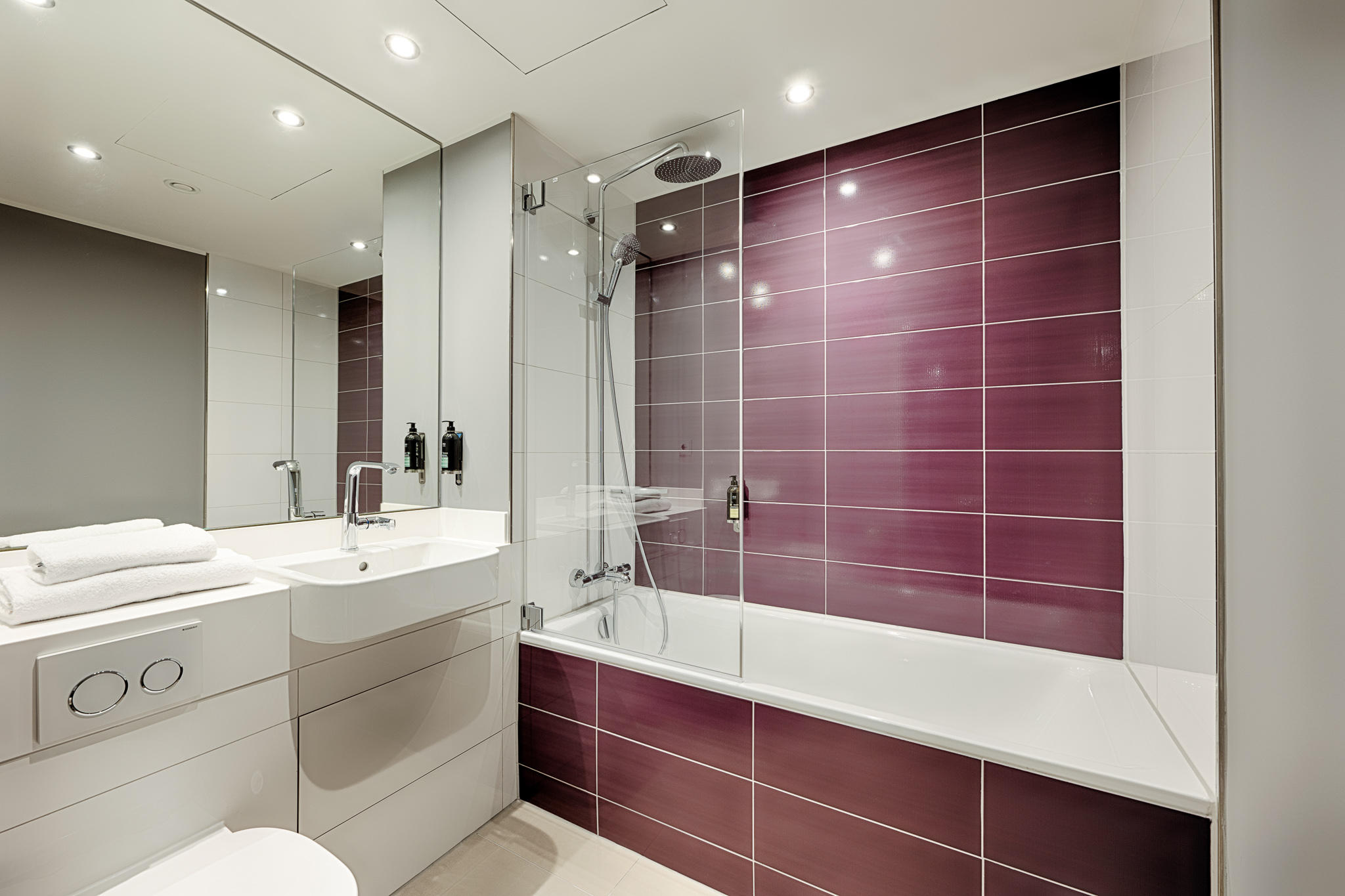 Premier Inn Hamburg City Klostertor hotel bathroom with bathtub and shower