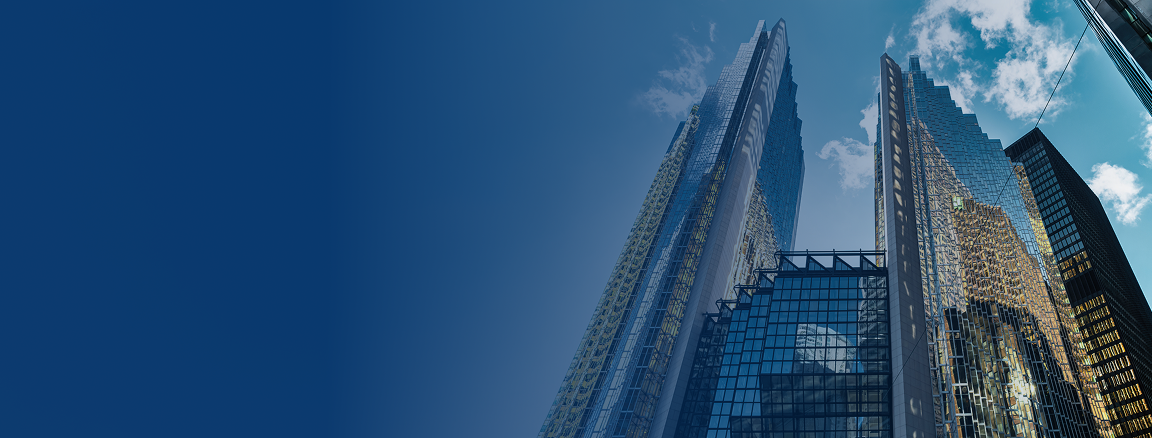 A bottom-up view of Royal Bank Plaza with a clear blue sky in the background.