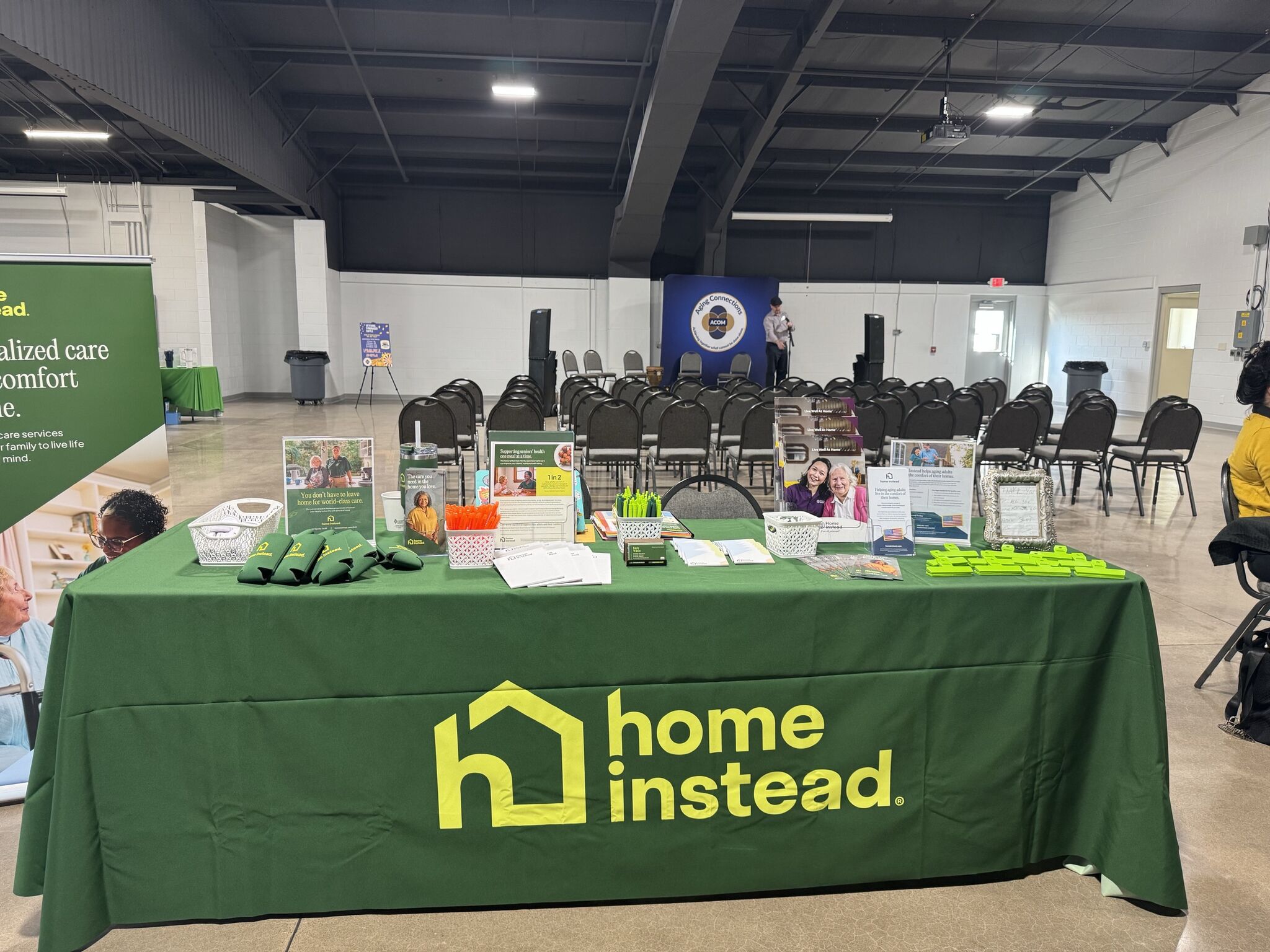 Home Instead team connecting with the community at a local event to share senior care resources and support.