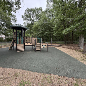 Safe, fenced playground area at Childcare Network where children enjoy active outdoor play