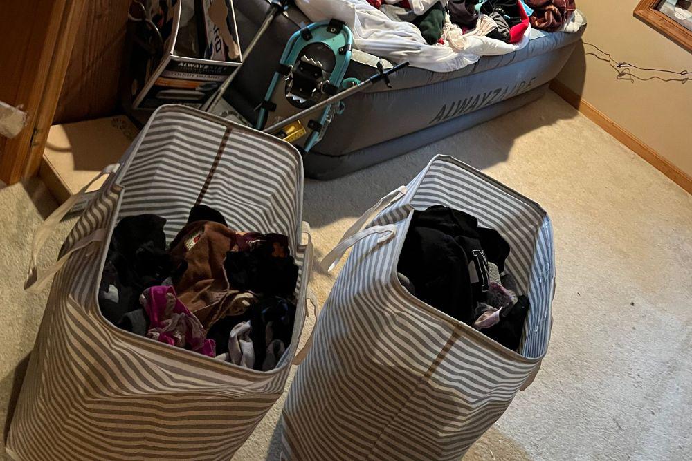 Pictured here are baskets of clothing exposed to Minneapolis water damage we were able to preserve.