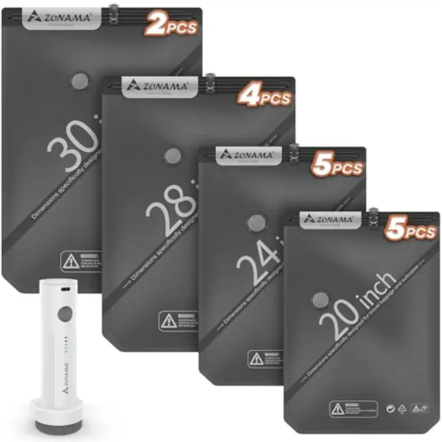A set of four dark gray ZONAMA brand packing cubes, labeled with sizes 30, 28, 24, and 20 inches, are arranged in a tiered display. Each cube features the ZONAMA logo and an orange 'PCS' indicator. A white ZONAMA branded cylindrical device with a button and LED indicator is positioned to the left of the packing cubes. The background is plain white.
