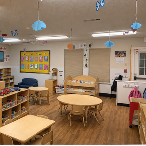 Bright and colorful preschool classroom at Childcare Network with age-appropriate learning materials