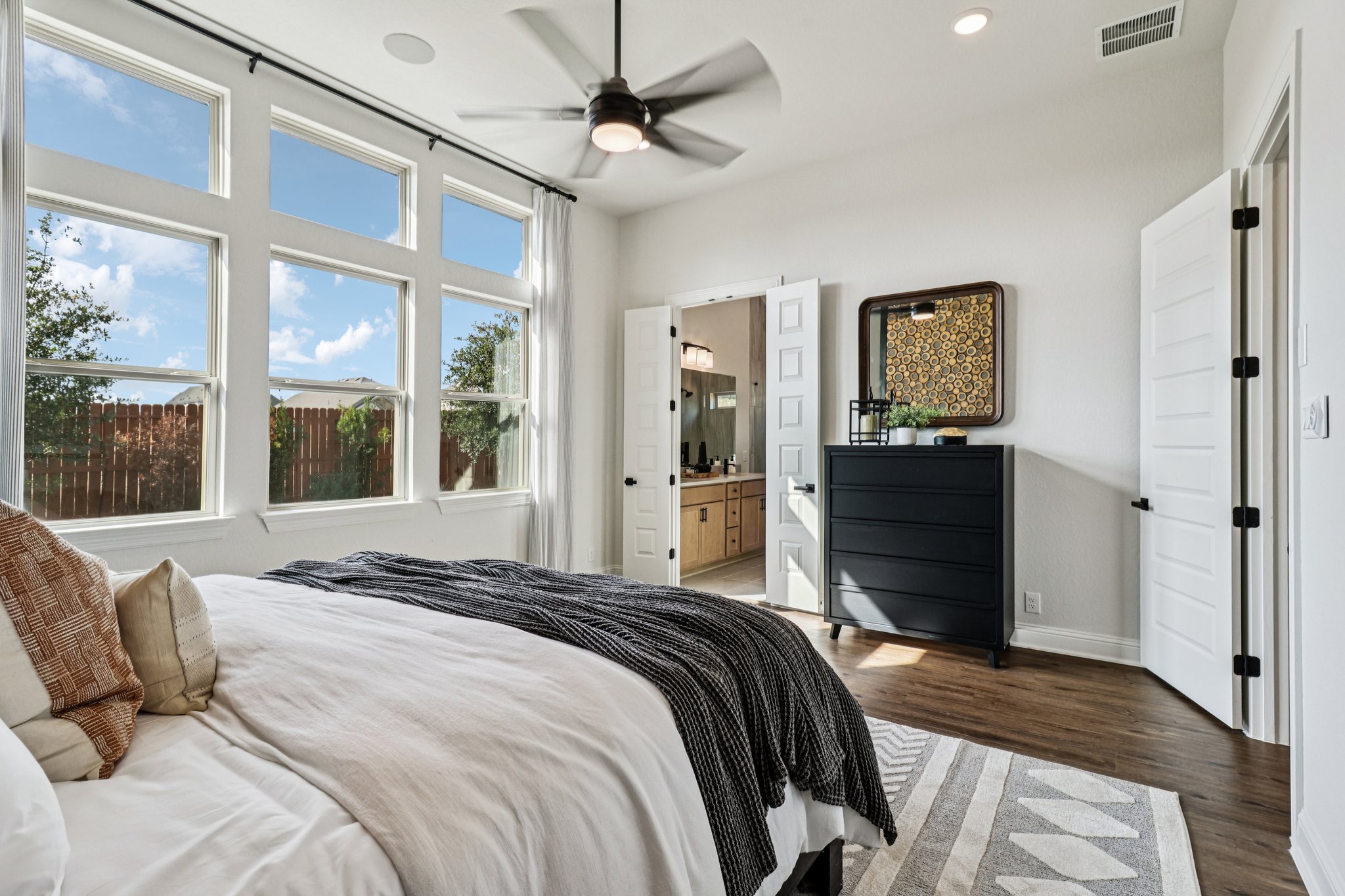 Owner's Suite is a Private Retreat Featuring Transom Windows for Additional Light and Architectural  