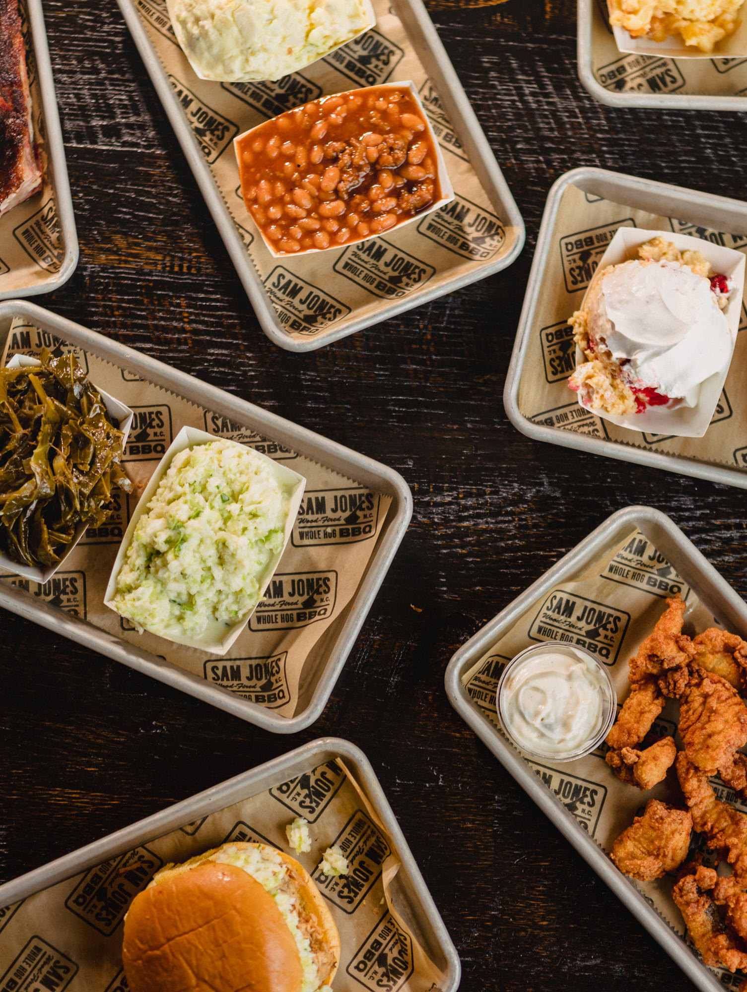 An array of barbecue, sides and dessert at Sam Jones BBQ restaurant in downtown Raleigh.