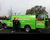 SERVPRO of North Highlands / Rio Linda's owners in front of there first SERVPRO work van.