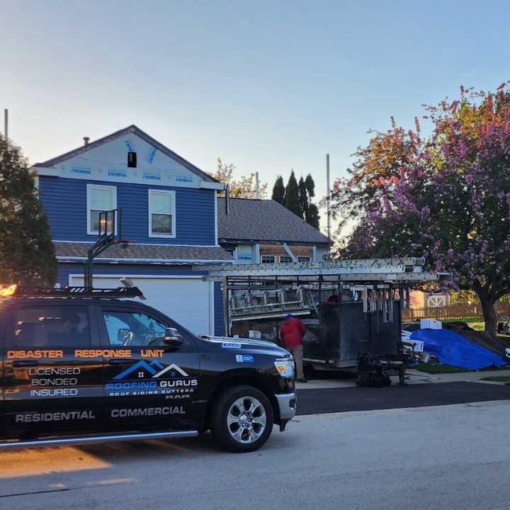 Images Roofing Gurus - Licensed roofing contractors for Roof Replacement & Leak Repair Chicago