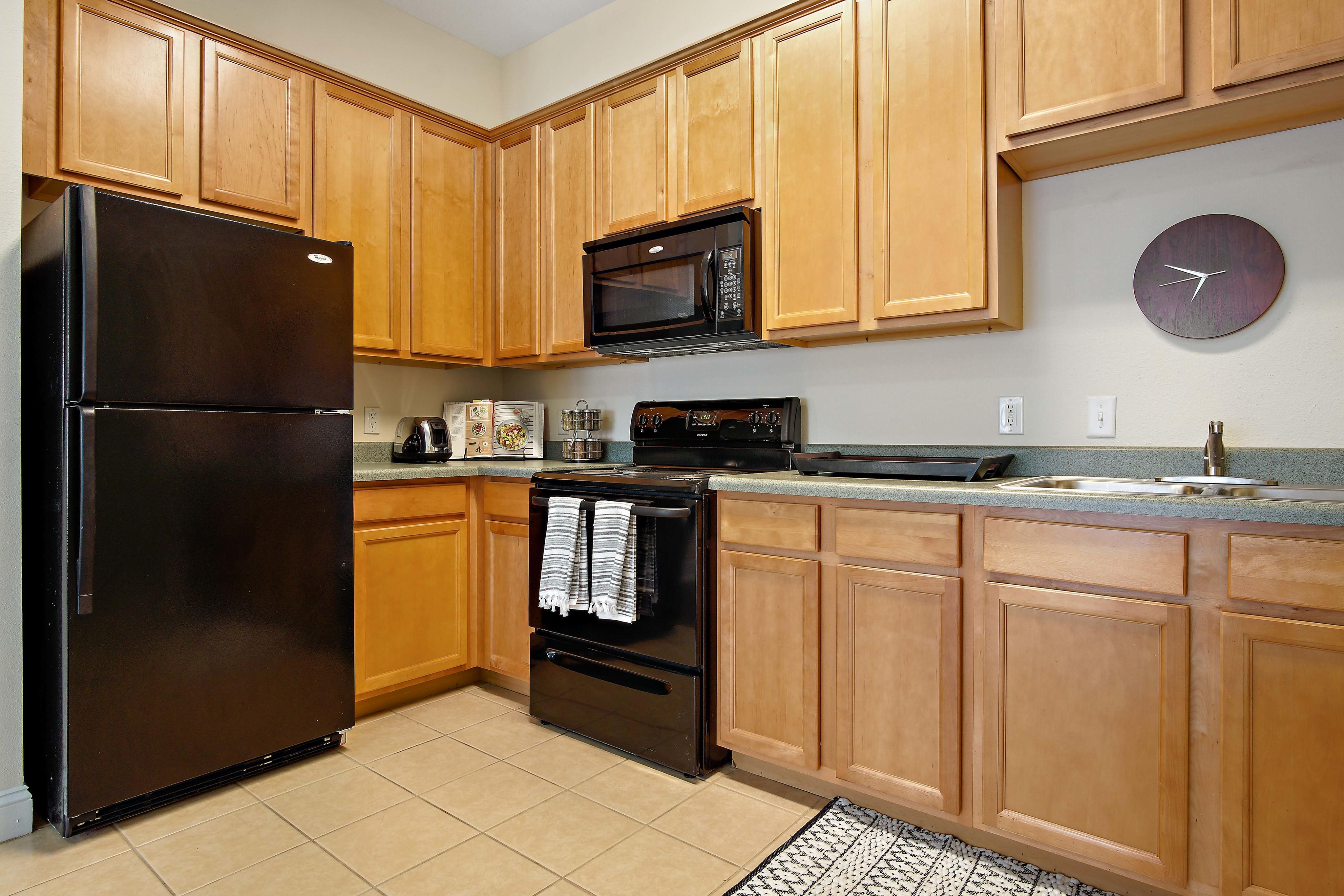 Large kitchen with a dishwasher. Central House on Stadium Apartments Mobile (251)272-4710