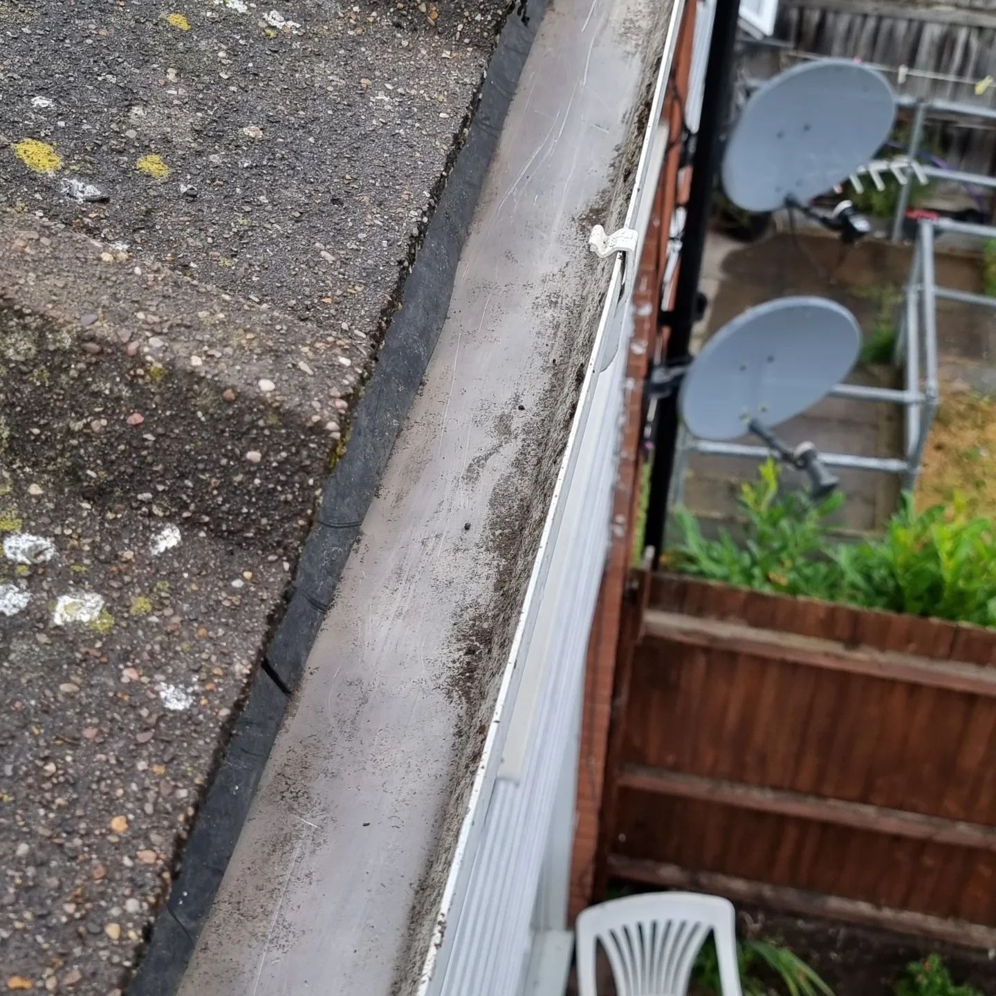 Gutter cleaning and clearing to prevent blockages and water damage