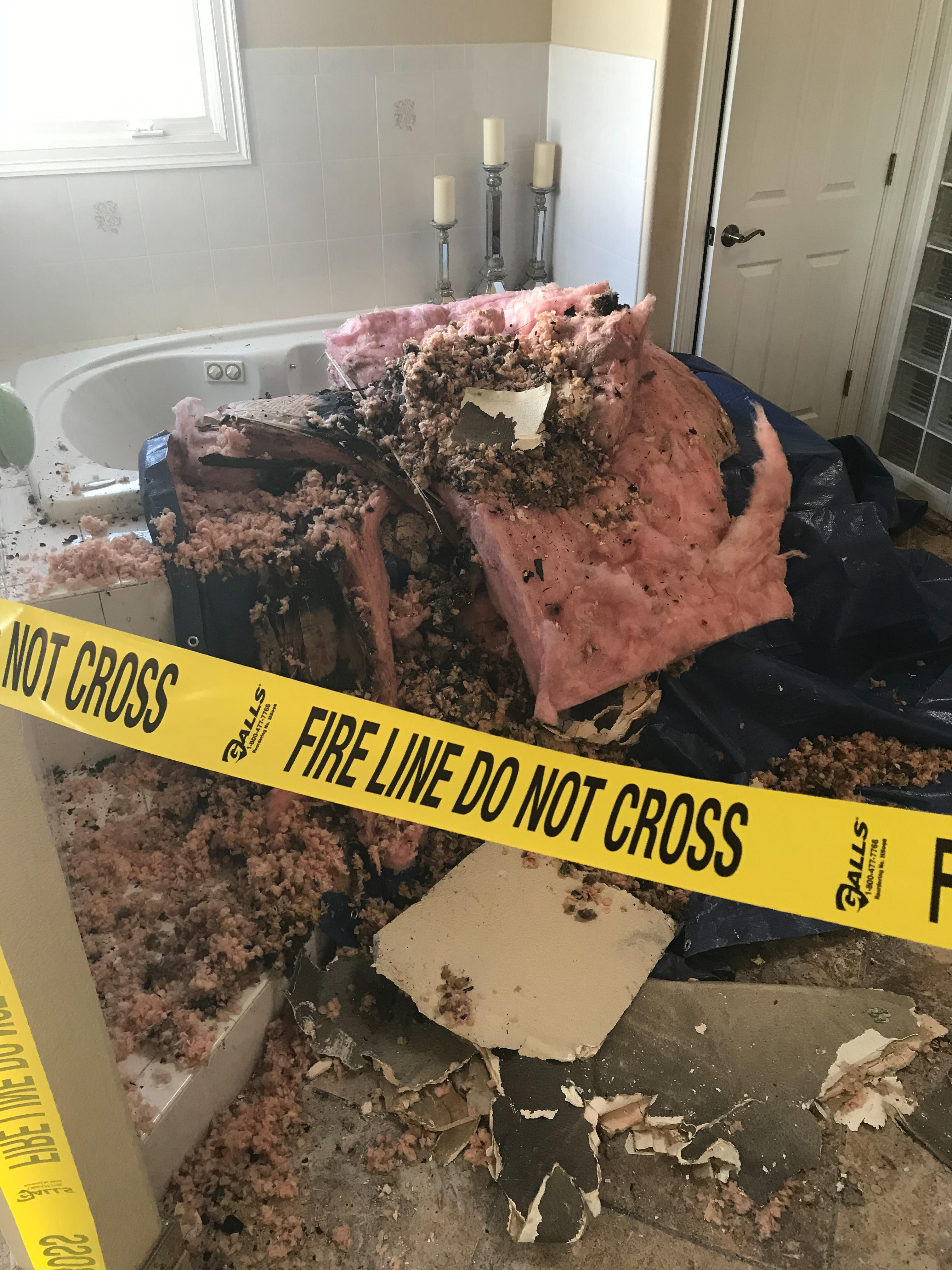 Fire damage can expose dangerous insulation from inside the walls.