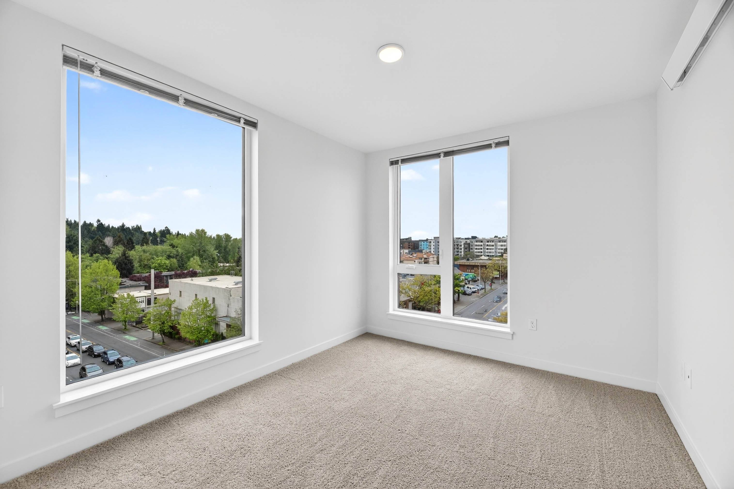 Bedroom with large windows