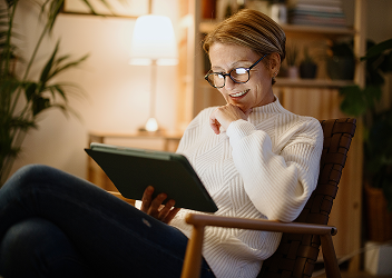 A client on their tablet in their living room.