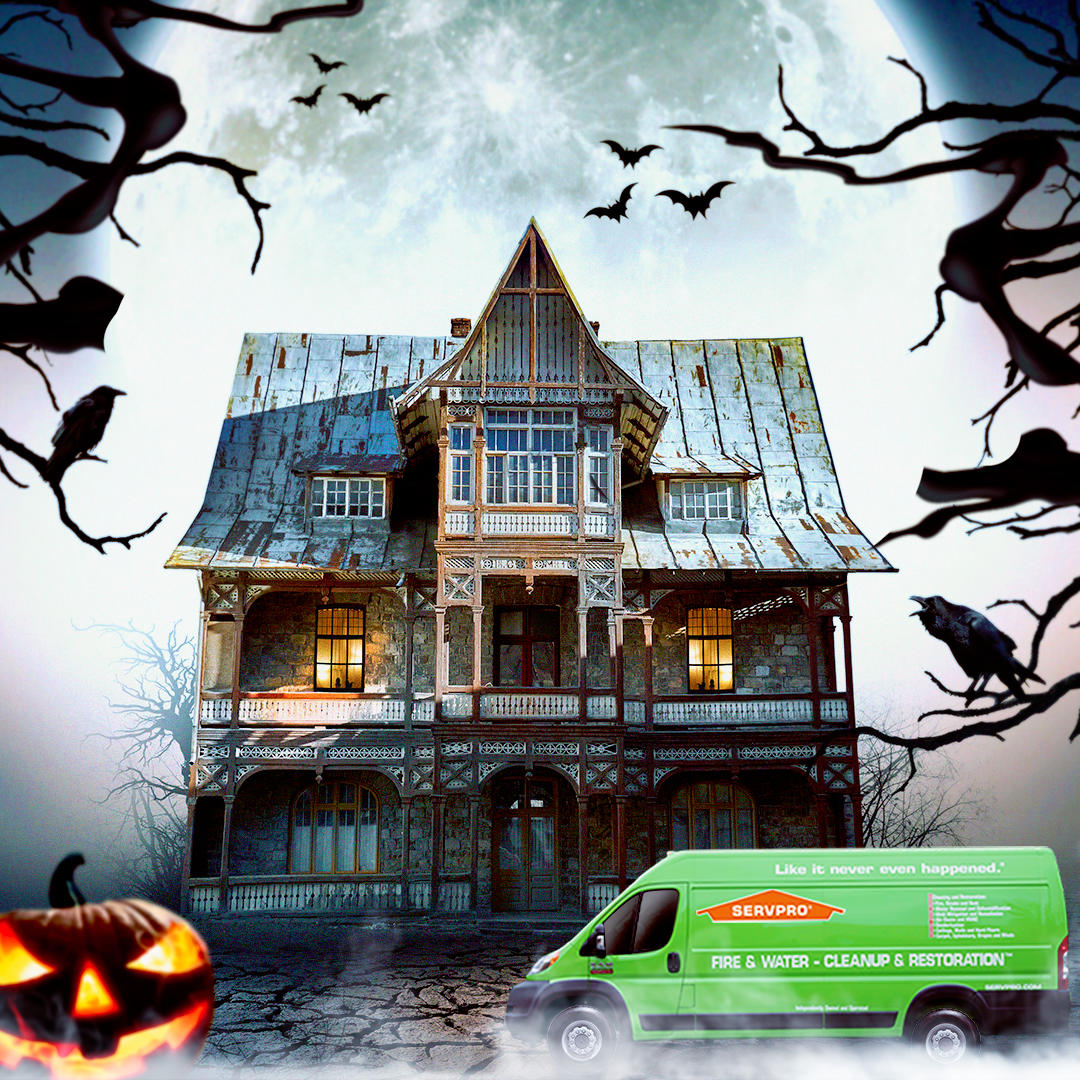 Halloween House with SERVPRO van in front