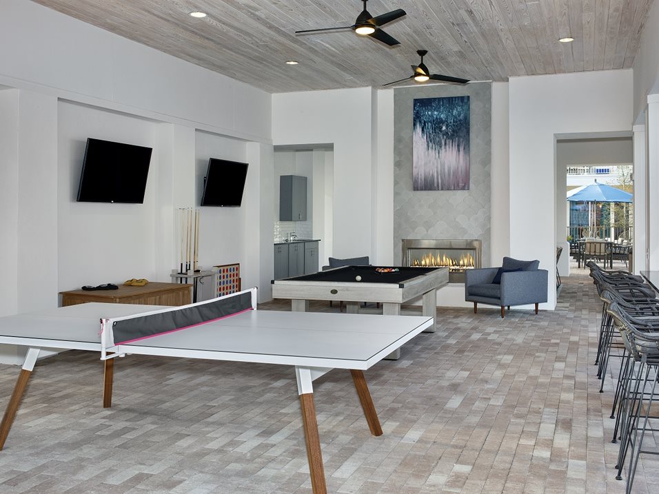 Game Room with Custom Billiards and Card Table at The Edison Apartments