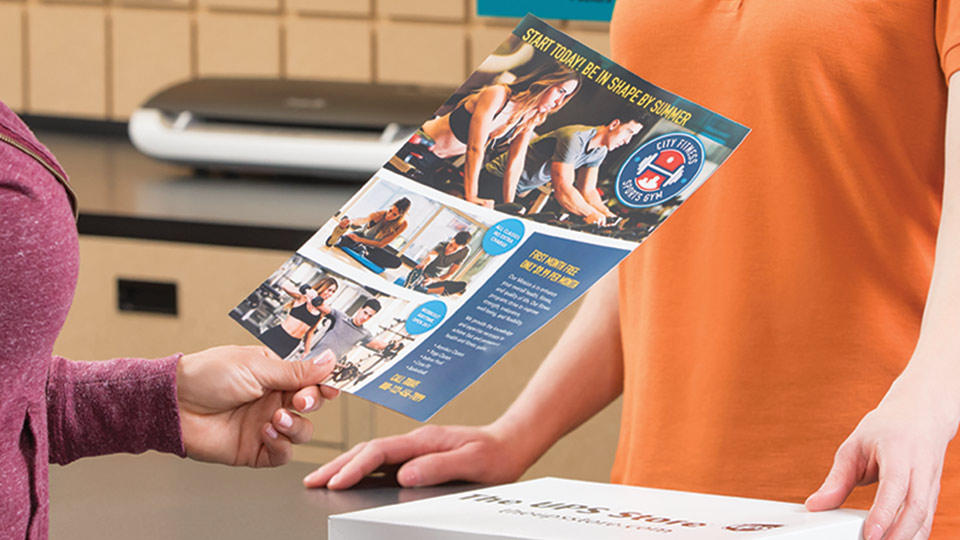 Close-up of a flyer for a fitness center