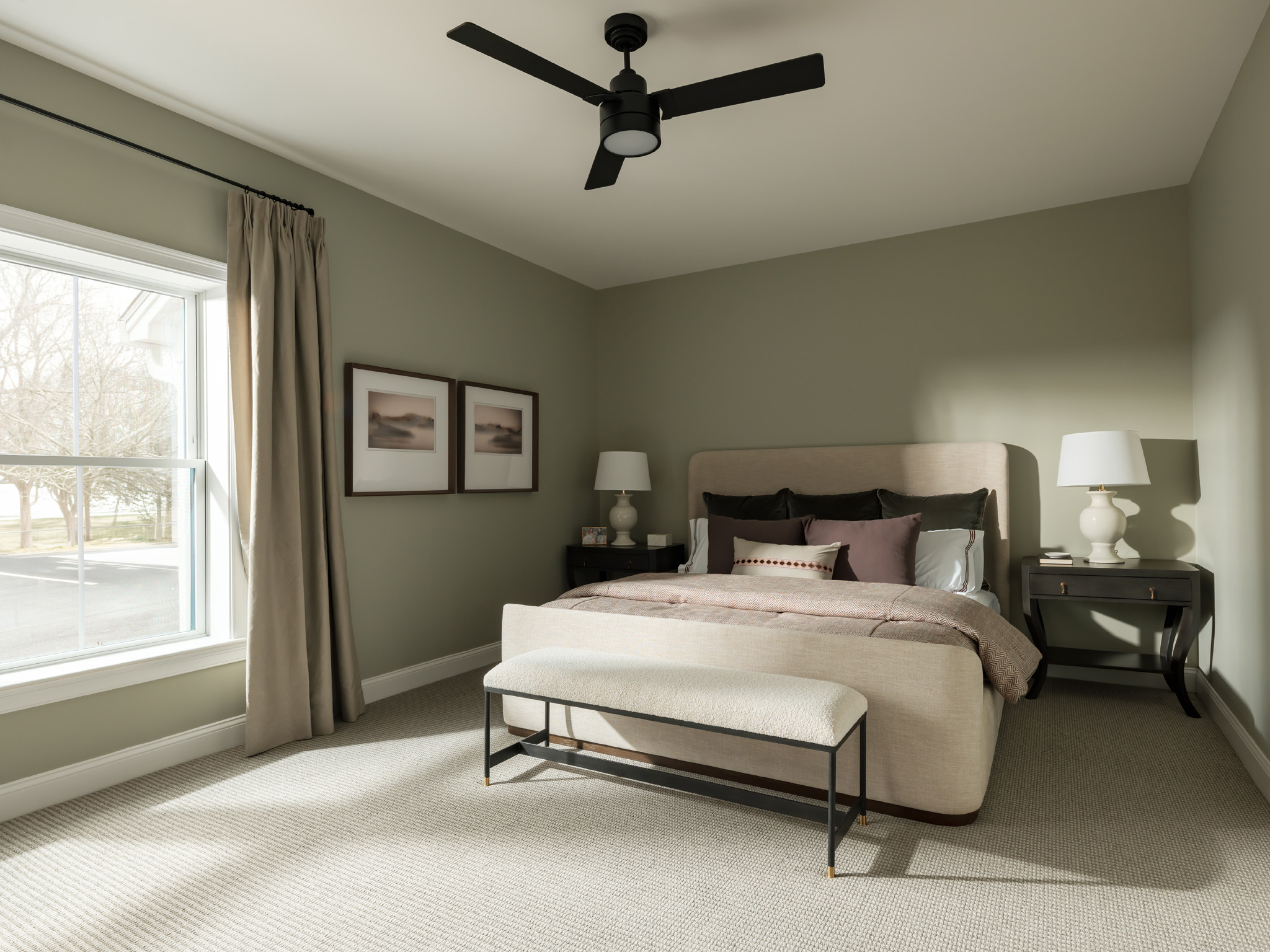 Large primary suite in the Featherwinds model home.