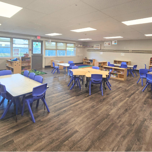 Bright and colorful preschool classroom at Childcare Network with age-appropriate learning materials