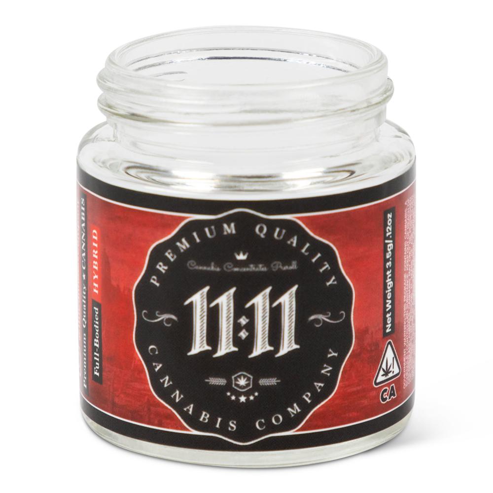 Glass cannabis jar with printed label for 11:11 Cannabis Company. Custom packaging by PLC Print.
