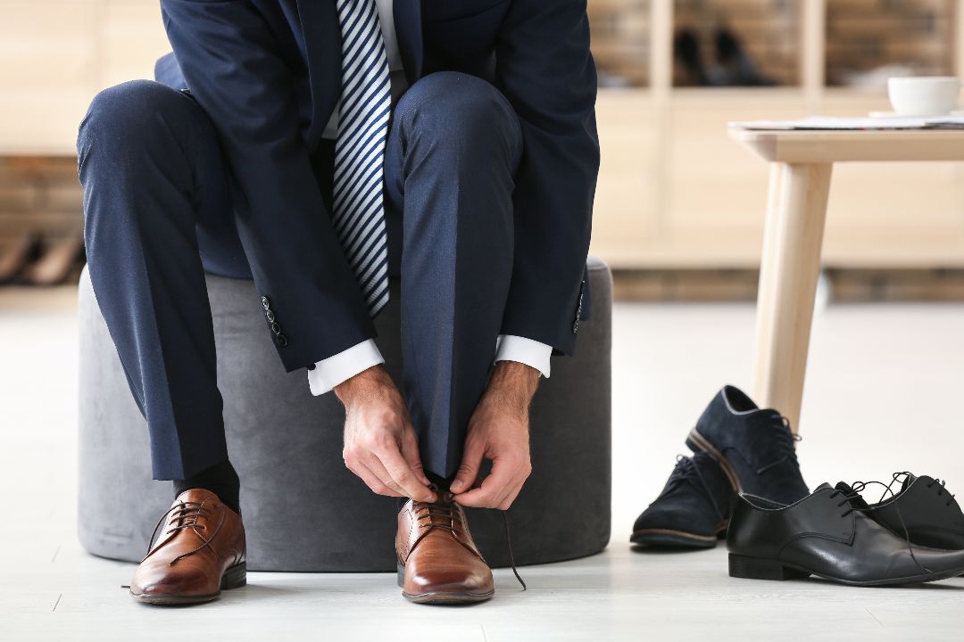 many trying on business shoes.jpg