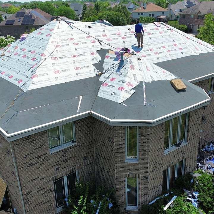 Images Roofing Gurus - Licensed roofing contractors for Roof Replacement & Leak Repair Chicago