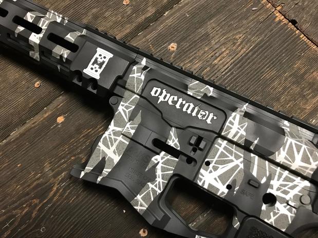 Images Armory Valentine, LLC Cerakote Coating, Laser Engraving & Custom Holsters