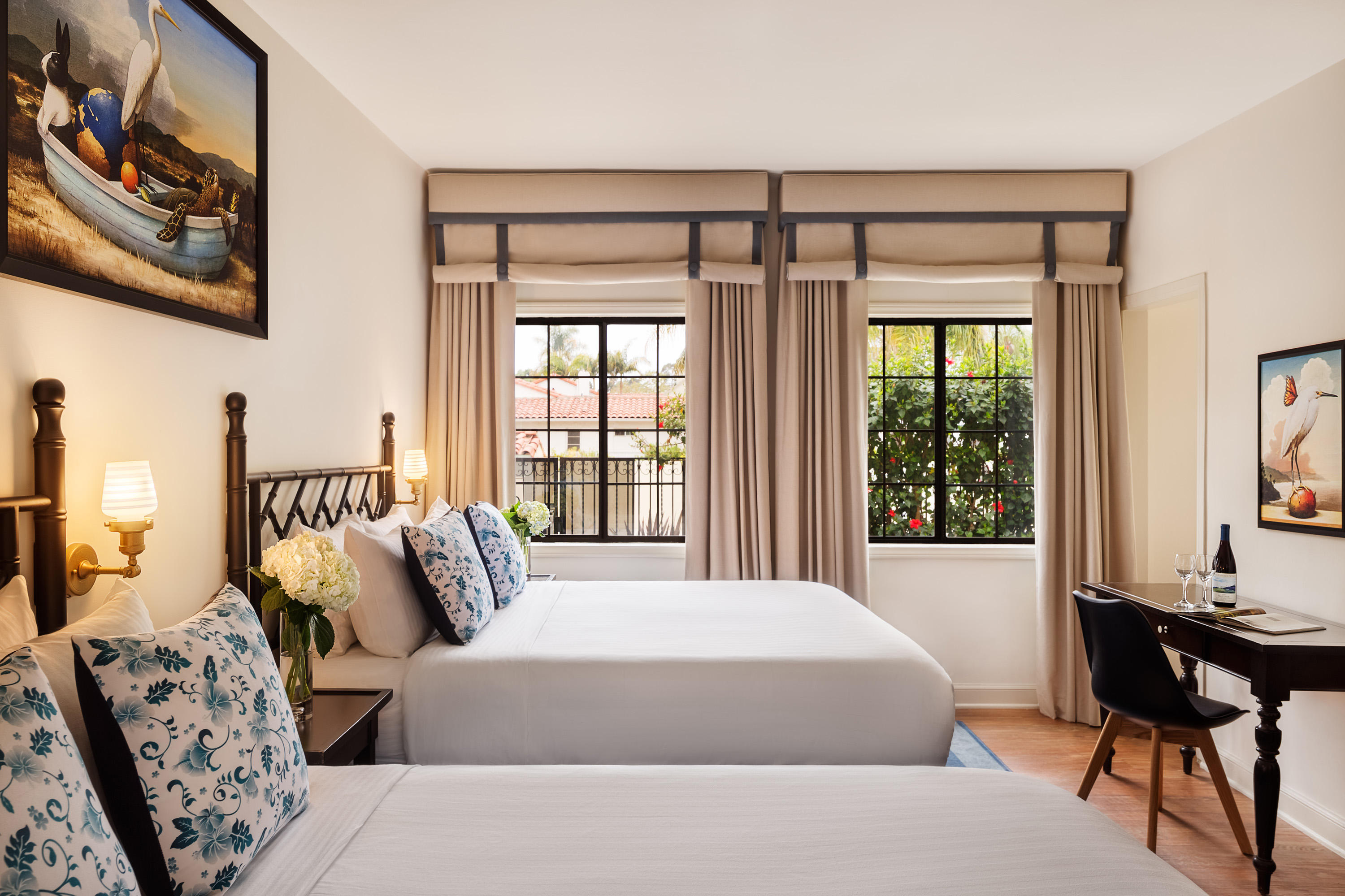 Bright and picturesque rooms offering garden, mountain or poolside views, with one king bed or two queen beds. Each room is approximately 250-350 square feet and features an LCD TV, iPod docking station and air conditioning. Deluxe King rooms accommodates up to 2 adults. Deluxe Double rooms accommodates up to 4 adults.