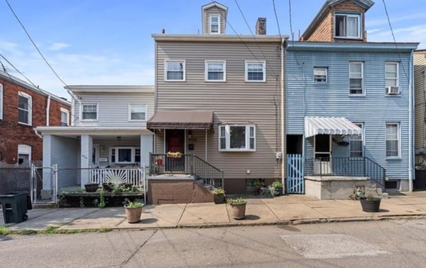 Images Ed Noschese and Kim Rostron Team - The Best Agents Ever, LLC