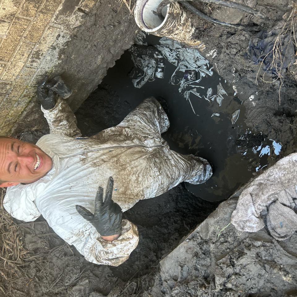 A bluefrog Plumbing and Drain team member working in West University